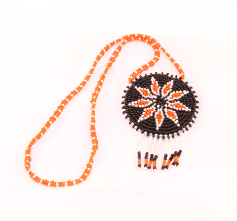 Orange and black beaded pendant necklace