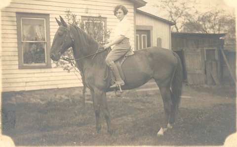 Carrie Goodell riding horse, ca. 1920