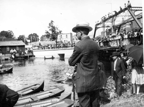 4th of July boat races at old mill bridge - blacksmith shop at left