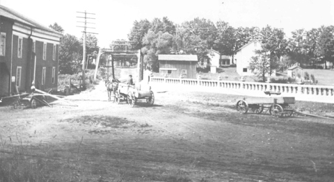 Old mill & bridge in horse and wagon days