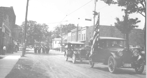 Annual Edinboro fair parade coming down Meadville St.