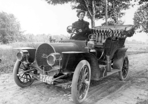 Mrs. Helen Dundon Rye drives an air cooled Franklin along Water St. Extension