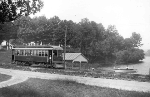 Street car stop by the boat house on the lake