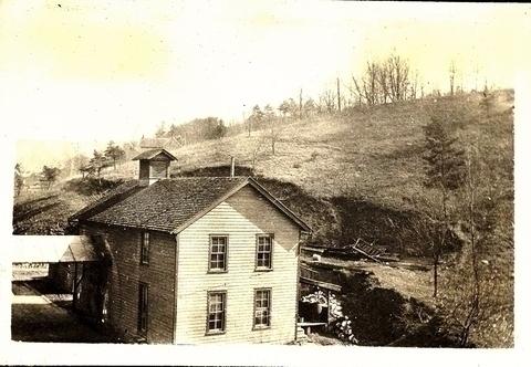 Building and hill behind women's dormitory